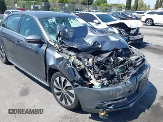 2013 Volkswagen Jetta Hybrid SE with VIN 3VW637AJ1DM232687, listed as a IAAI auction lot 41973407 with 70,428 mi miles and . Bid and sale history available at DreamBid. Image 6.