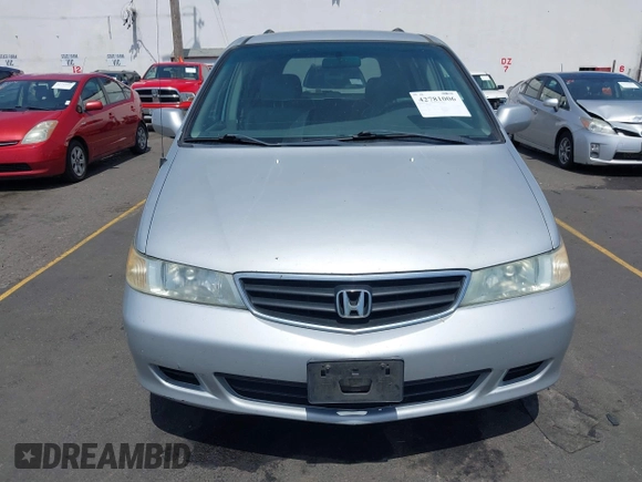 2003 Honda Odyssey EX-L with VIN 5FNRL18993B098670, listed as a IAAI auction lot 42781006 with 222,584 mi miles and . Bid and sale history available at DreamBid. Image 6.