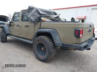 2020 Jeep Gladiator Sport S with VIN 1C6HJTAG0LL169992, listed as a IAAI auction lot 41488773 with Not Provided miles. Bid and sale history available at carsss.com. Image 3.