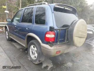 2002 Kia Sportage with VIN KNDJB723925161368, listed as a IAAI auction lot 41045568 with 168,167 mi miles. Bid and sale history available at carsss.com. Image 3.