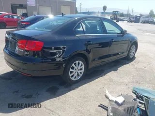 2013 Volkswagen Jetta SE with VIN 3VWDP7AJ7DM369161, listed as a IAAI auction lot 42277592 with 107,609 mi miles and . Bid and sale history available at DreamBid. Image 4.