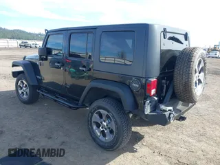 2009 Jeep Wrangler Unlimited X with VIN 1J4GA391X9L701403, listed as a IAAI auction lot 41890659 with 143,619 mi miles. Bid and sale history available at carsss.com. Image 3.