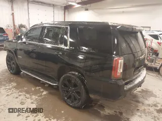 2016 GMC Yukon SLE with VIN 1GKS2AKC1GR276262, listed as a IAAI auction lot 41336378 with 213,182 mi miles. Bid and sale history available at carsss.com. Image 3.