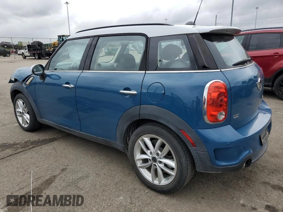 2012 MINI Countryman S with VIN WMWZC3C57CWL86423, listed as a Copart auction lot 57584195 with 102,184 mi miles and Salvage title. Bid and sale history available at DreamBid. Image 2.