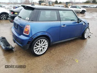 2007 MINI Hardtop S with VIN WMWMF735X7TT80244, listed as a Copart auction lot 46060635 with 116,032 mi miles and Salvage Title. Bid and sale history available at DreamBid. Image 3.