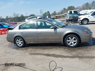 2005 Nissan Altima 3.5 SE with VIN 1N4BL11DX5C353106, listed as a IAAI auction lot 41833288 with 148,146 mi miles. Bid and sale history available at carsss.com. Image 13.