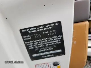 2011 Aston Martin DB9 z VIN SCFFDAAE8BGA13186, wystawiony jako Copart lot #74703544 z przebiegiem Nie podano mil oraz Szkody całkowita. Historia ofert i sprzedaży dostępna na DreamBid. Obrazek 13.