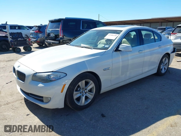 2013 BMW 5 Series 528i with VIN WBAXG5C56DDY31982, listed as a IAAI auction lot 40906428 with 248,336 mi miles and . Bid and sale history available at carsss.com. Image 16.