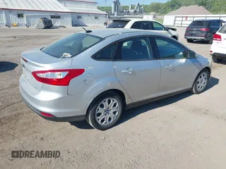 2012 Ford Focus SE with VIN 1FAHP3F20CL166889, listed as a IAAI auction lot 42268817 with 132,717 mi miles and . Bid and sale history available at DreamBid. Image 4.