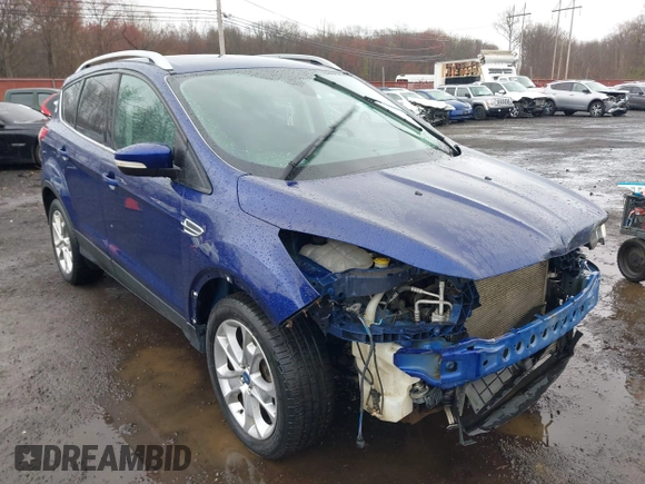 2014 Ford Escape Titanium with VIN 1FMCU9J99EUA46103, listed as a IAAI auction lot 42018097 with 169,878 mi miles and . Bid and sale history available at DreamBid. Image 6.