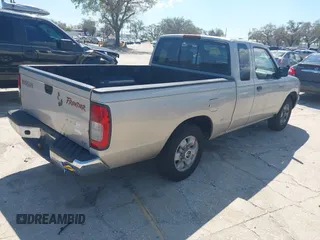 1999 Nissan Frontier XE z VIN 1N6DD26S4XC337030, wystawiony jako IAAI lot #41683250 z przebiegiem 143 765 mil mil oraz . Historia ofert i sprzedaży dostępna na DreamBid. Obrazek 4.
