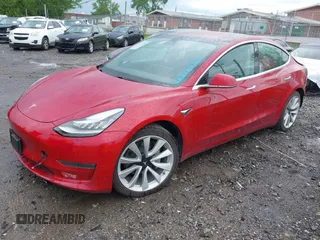 2018 Tesla Model 3 Long Range Battery with VIN 5YJ3E1EA6JF052659, listed as a IAAI auction lot 42093903 with 49,255 mi miles and . Bid and sale history available at DreamBid. Image 20.