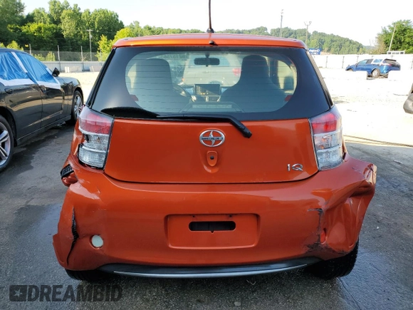 2012 Scion iQ z VIN JTNJJXB0XCJ020404, wystawiony jako Copart lot #62157565 z przebiegiem 82 869 mil mil oraz Nie do naprawy • Non repairable. Historia ofert i sprzedaży dostępna na DreamBid. Obrazek 6.