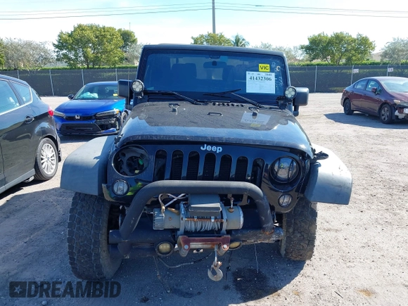 2016 Jeep Wrangler Willys Wheeler z VIN 1C4AJWAG9GL257621, wystawiony jako IAAI lot #41432306 z przebiegiem 84 248 mil mil oraz . Historia ofert i sprzedaży dostępna na DreamBid. Obrazek 12.