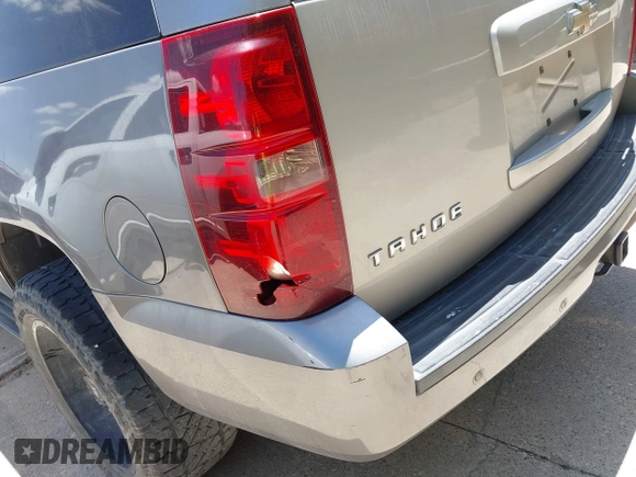 2007 Chevrolet Tahoe LT with VIN 1GNFC13007J405418, listed as a IAAI auction lot 42631830 with 225,156 mi miles and . Bid and sale history available at DreamBid. Image 6.