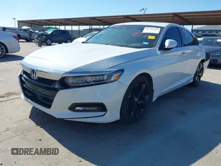 2018 Honda Accord Touring z VIN 1HGCV1F96JA144076, wystawiony jako IAAI lot #41561688 z przebiegiem 125 539 mil mil oraz . Historia ofert i sprzedaży dostępna na DreamBid. Obrazek 2.