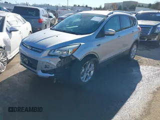 2014 Ford Escape Titanium with VIN 1FMCU0JX7EUC59643, listed as a IAAI auction lot 41082952 with 143,899 mi miles. Bid and sale history available at carsss.com. Image 18.