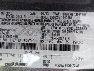 2013 Ford Focus Titanium with VIN 1FADP3J28DL225887, listed as a IAAI auction lot 42122968 with 139,248 mi miles and . Bid and sale history available at carsss.com. Image 9.