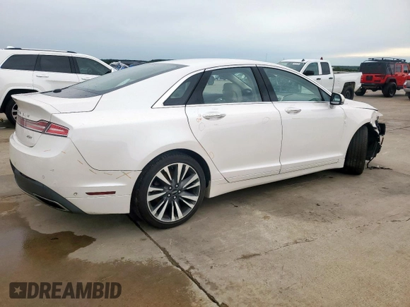 2019 Lincoln MKZ Reserve II с VIN 3LN6L5E91KR607836, выставлен на аукционе Copart как лот 60242425 с пробегом 81 739 миль миль и Списание • Salvage title. История ставок и продаж доступна на DreamBid. Изображение 3.