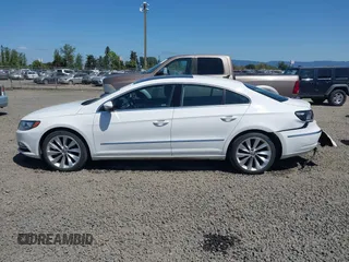 2013 Volkswagen CC Lux z VIN WVWHU7AN1DE500722, wystawiony jako IAAI lot #42072779 z przebiegiem 188 987 mil mil oraz . Historia ofert i sprzedaży dostępna na DreamBid. Obrazek 14.