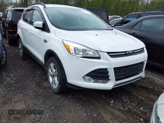 2016 Ford Escape SE with VIN 1FMCU9GX6GUB65266, listed as a IAAI auction lot 41559663 with 55,883 mi miles and . Bid and sale history available at DreamBid. Image 1.