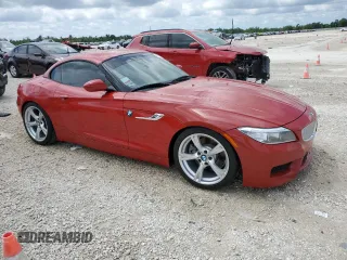 2015 BMW Z4 sDrive35i with VIN WBALM7C51FJ798977, listed as a Copart auction lot 49357184 with 55,895 mi miles and Salvage Title. Bid and sale history available at carsss.com. Image 4.