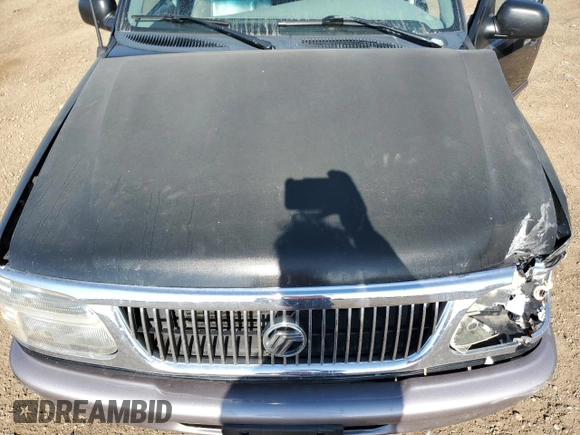 1997 Mercury Mountaineer with VIN 4M2DU55P5VUJ62435, listed as a Copart auction lot 60163465 with 105,646 mi miles and Salvage title. Bid and sale history available at DreamBid. Image 12.