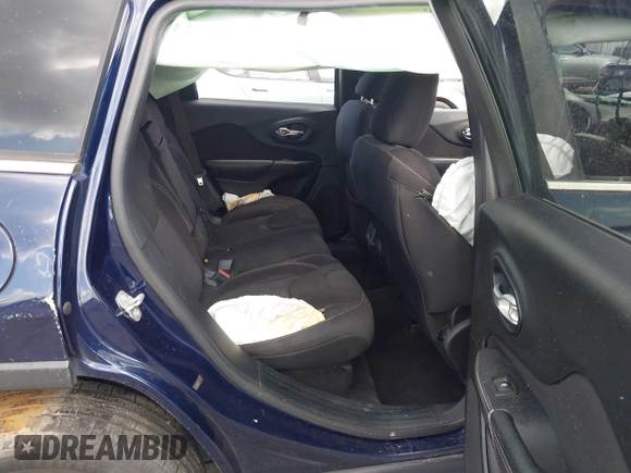 2015 Jeep Cherokee Latitude with VIN 1C4PJLCB5FW694359, listed as a IAAI auction lot 41934213 with 117,723 mi miles and . Bid and sale history available at DreamBid. Image 8.