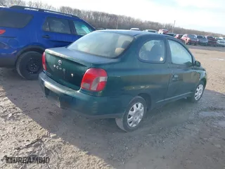 2000 Toyota ECHO with VIN JTDAT1238Y5008595, listed as a IAAI auction lot 41867974 with 276,313 mi miles. Bid and sale history available at carsss.com. Image 4.