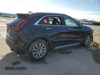 2020 Cadillac XT4 FWD Premium Luxury with VIN 1GYFZCR4XLF070463, listed as a Copart auction lot 47870865 with 88,406 mi miles and Non Repairable. Bid and sale history available at carsss.com. Image 3.