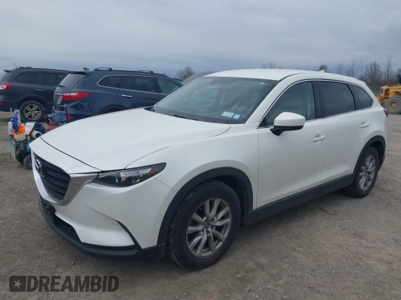 2017 Mazda CX-9 Sport with VIN JM3TCBBY3H0139514, listed as a IAAI auction lot 42082162 with 54,077 mi miles and . Bid and sale history available at DreamBid. Image 2.