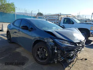2024 Toyota Prius SE z VIN JTDACACU4R3013796, wystawiony jako IAAI lot #41866441 z przebiegiem 49 837 mil mil oraz . Historia ofert i sprzedaży dostępna na DreamBid. Obrazek 1.
