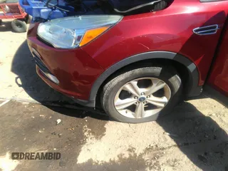 2014 Ford Escape SE with VIN 1FMCU0GX5EUA57746, listed as a IAAI auction lot 41825217 with 150,496 mi miles. Bid and sale history available at carsss.com. Image 6.