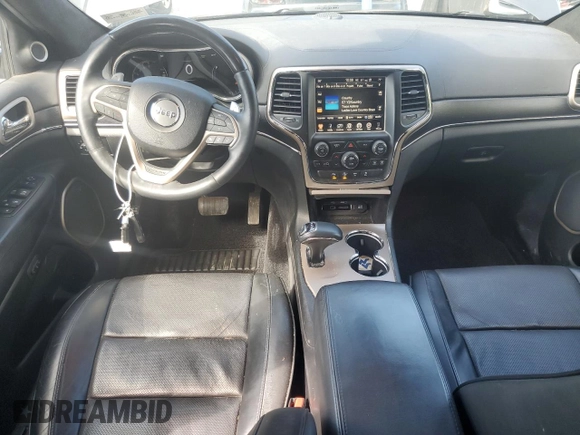 2014 Jeep Grand Cherokee Summit with VIN 1C4RJFJT4EC346946, listed as a Copart auction lot 60613025 with 50,565 mi miles and Salvage title. Bid and sale history available at DreamBid. Image 8.