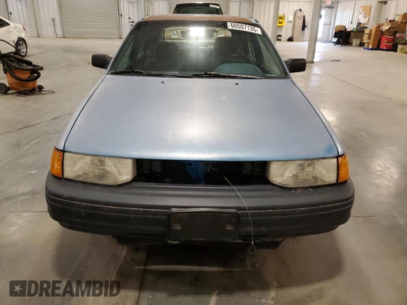 1994 Ford Escort z VIN 1FARP14J9RW318226, wystawiony jako Copart lot #60507135 z przebiegiem 69 041 mil mil oraz Szkoda całkowita • Salvage title. Historia ofert i sprzedaży dostępna na DreamBid. Obrazek 5.