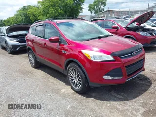 2013 Ford Escape SE z VIN 1FMCU9GX8DUB80346, wystawiony jako IAAI lot #42789409 z przebiegiem 157 200 mil mil oraz . Historia ofert i sprzedaży dostępna na DreamBid. Obrazek 1.