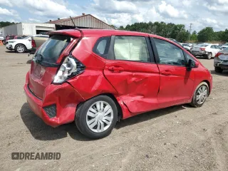 2016 Honda Fit LX with VIN JHMGK5H54GX010407, listed as a Copart auction lot 60127785 with 70,089 mi miles and Salvage title. Bid and sale history available at DreamBid. Image 3.
