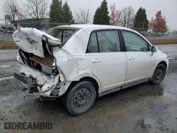 2007 Nissan Versa 1.8 SL with VIN 3N1BC11E67L402475, listed as a Copart auction lot 84464734 with 62,399 mi miles and Salvage Title. Bid and sale history available at carsss.com. Image 3.