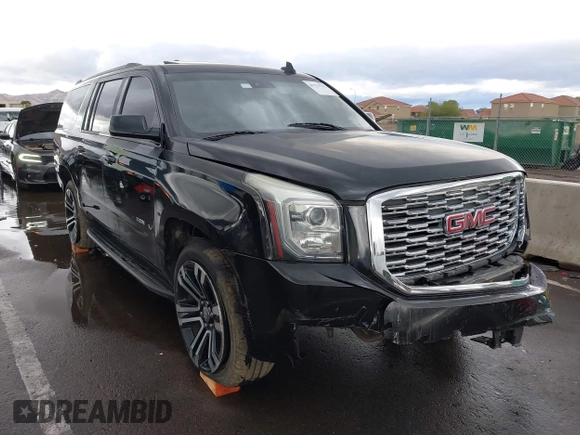 2019 GMC Yukon XL SLT with VIN 1GKS1GKC7KR155668, listed as a IAAI auction lot 41751792 with 163,537 mi miles. Bid and sale history available at carsss.com. Image 1.