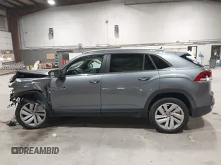 2022 Volkswagen Atlas SE z VIN 1V2KE2CA1NC206765, wystawiony jako IAAI lot #41876747 z przebiegiem 83 304 mil mil oraz . Historia ofert i sprzedaży dostępna na DreamBid. Obrazek 14.