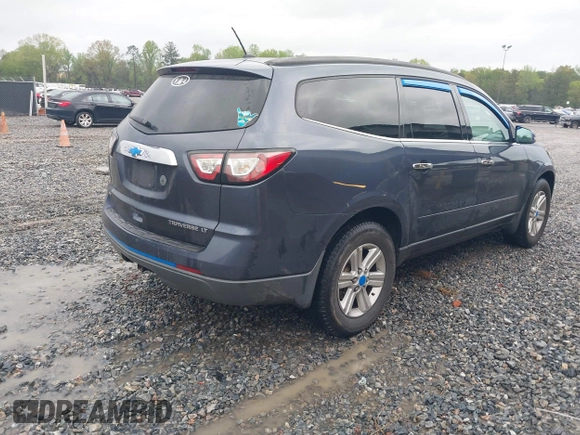 2013 Chevrolet Traverse LT with VIN 1GNKVGKD5DJ130012, listed as a IAAI auction lot 41909148 with 169,485 mi miles and . Bid and sale history available at DreamBid. Image 4.