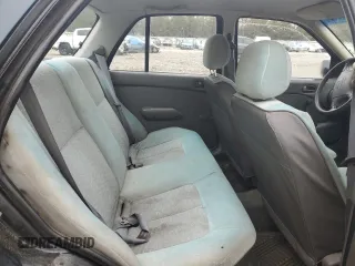 1996 Kia Sephia RS z VIN KNAFA1256T5265533, wystawiony jako Copart lot #48195555 z przebiegiem 225 062 mil mil oraz Szkody całkowita. Historia ofert i sprzedaży dostępna na DreamBid. Obrazek 10.