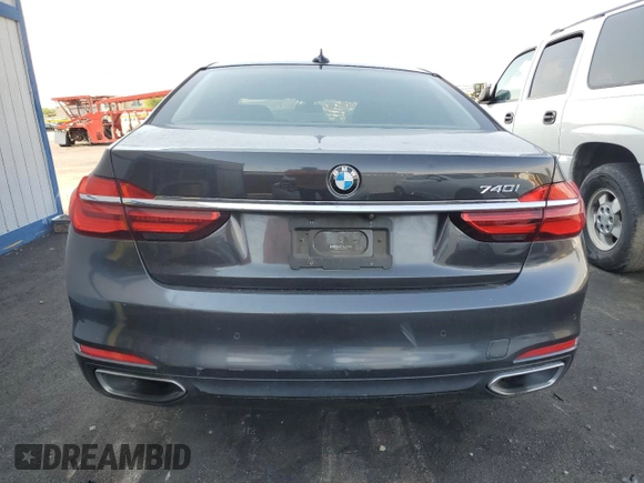 2019 BMW 7 Series 740i with VIN WBA7E2C52KB217153, listed as a Copart auction lot 65205835 with 61,981 mi miles and Clean title. Bid and sale history available at DreamBid. Image 6.