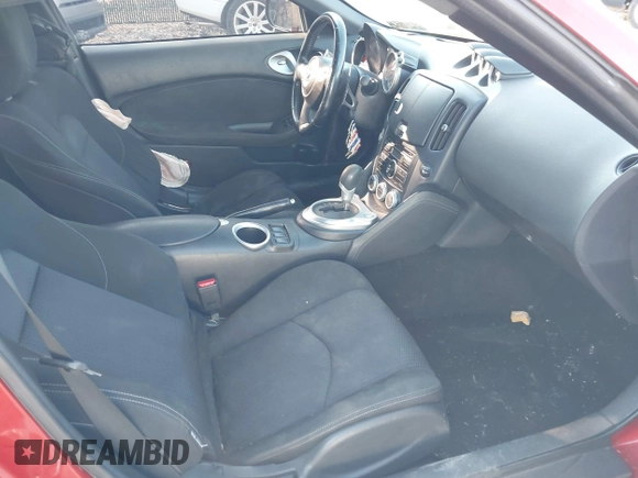 2014 Nissan 370Z Nismo with VIN JN1AZ4EH9EM636340, listed as a IAAI auction lot 42112548 with 143,894 mi miles and . Bid and sale history available at DreamBid. Image 5.