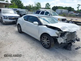 2015 Scion tC z VIN JTKJF5C79F3093318, wystawiony jako IAAI lot #42186403 z przebiegiem 178 922 mil mil oraz . Historia ofert i sprzedaży dostępna na DreamBid. Obrazek 1.