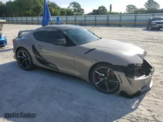 2022 Toyota GR Supra 3.0 with VIN WZ1DB0C0XNW051907, listed as a Copart auction lot 70628834 with 23,012 mi miles and Salvage Title. Bid and sale history available at carsss.com. Image 4.