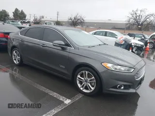 2015 Ford Fusion Energi Titanium with VIN 3FA6P0SU2FR173958, listed as a IAAI auction lot 41504220 with 170,235 mi miles. Bid and sale history available at carsss.com. Image 1.