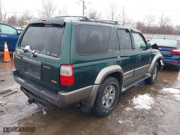 2000 Toyota 4Runner Limited with VIN JT3HN87R6Y0265299, listed as a IAAI auction lot 41569862 with 216,917 mi miles. Bid and sale history available at carsss.com. Image 4.