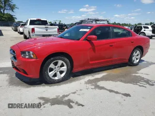 2013 Dodge Charger SE z VIN 2C3CDXBG1DH591742, wystawiony jako Copart lot #58427145 z przebiegiem 77 307 mil mil oraz Tytuł czysty. Historia ofert i sprzedaży dostępna na DreamBid. Obrazek 1.