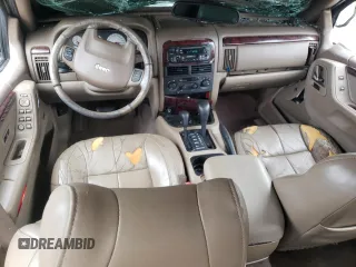 2001 Jeep Grand Cherokee Limited with VIN 1J4GW58S11C649736, listed as a Copart auction lot 66080214 with 199,584 mi miles and Salvage Title. Bid and sale history available at carsss.com. Image 8.